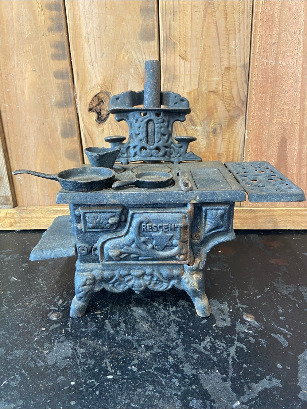 Crescent Black Cast Iron Toy Stove with Pans vintages